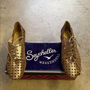 Brand new Seychelles Gold Lace-Up Flats